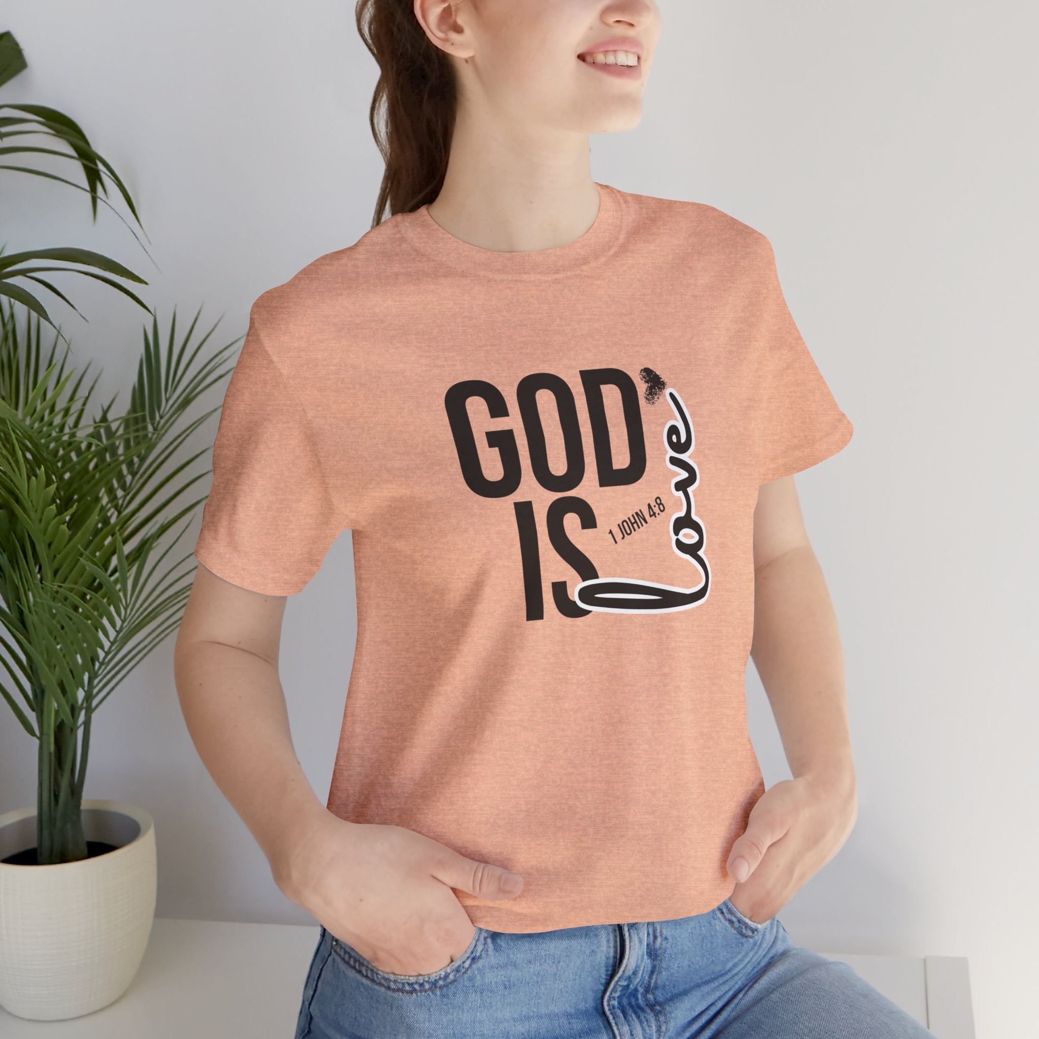 God Is Love T‑Shirt — Christian Faith Tee with Script Heart Design